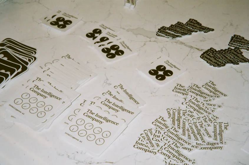 Intelligence stickers and cards on a table